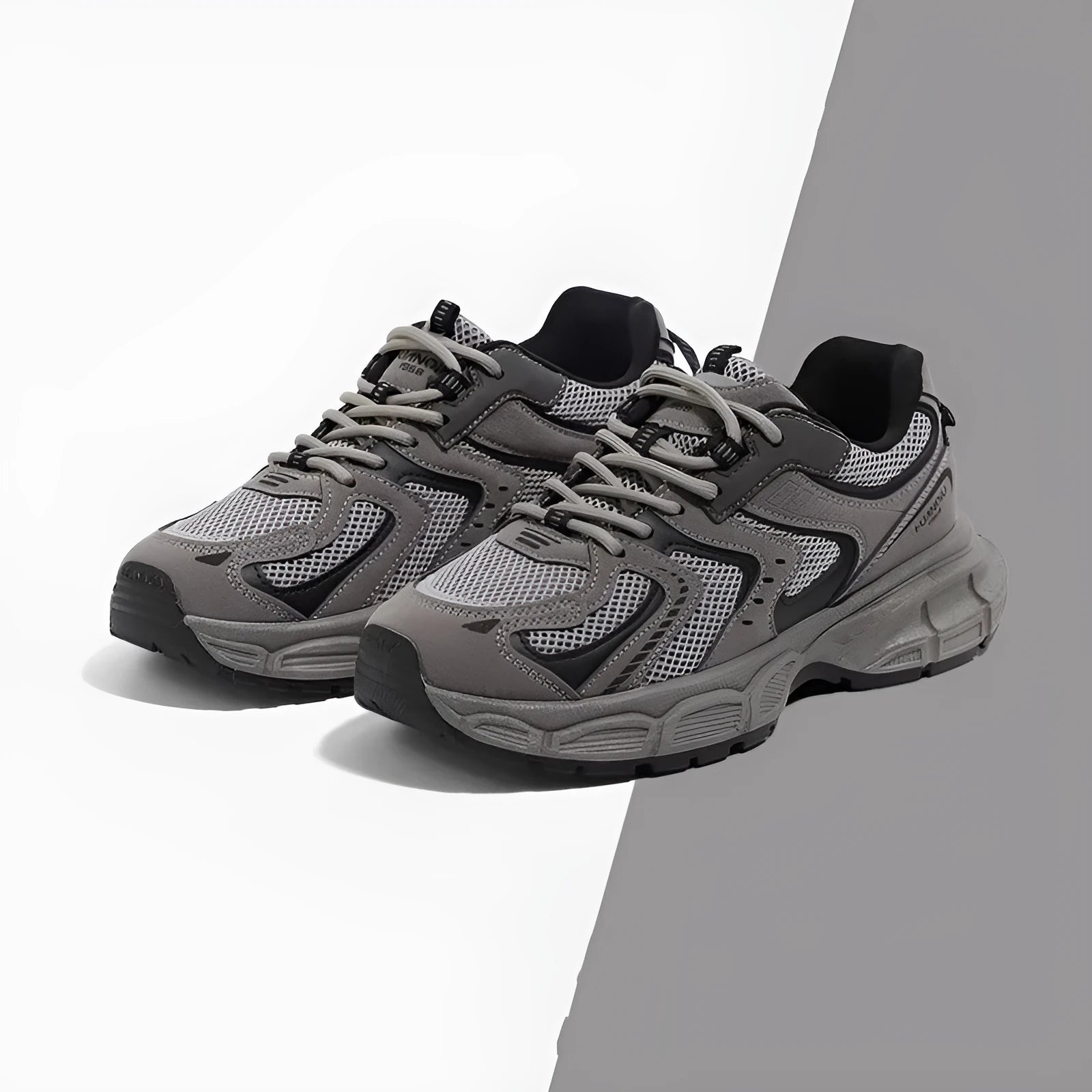Low-top Dad style casual sneaker with round toe, leather stitching, and front lace-up closure on EVA platform sole