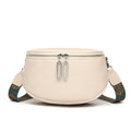 Women's soft PU leather messenger bag in saddle shape with crossbody strap and outer pocket