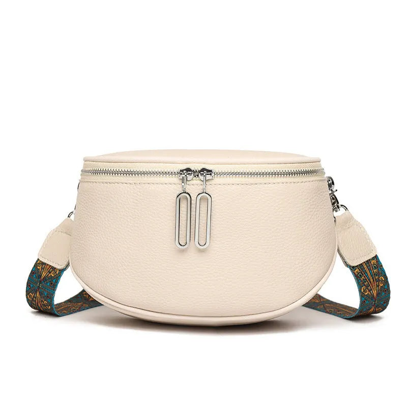 Women's soft PU leather messenger bag in saddle shape with crossbody strap and outer pocket