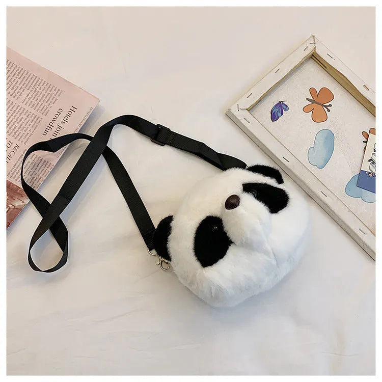 Plush panda head crossbody bag showing cylindrical shape and sandwich pocket organisation