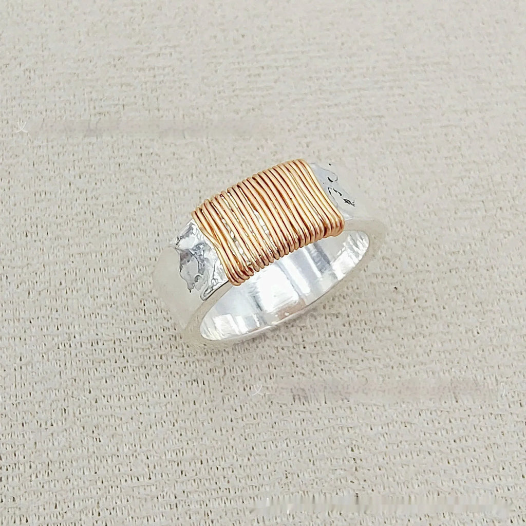 Copper bracelet with vintage ring design featuring irregular coil pattern in silver golden colour