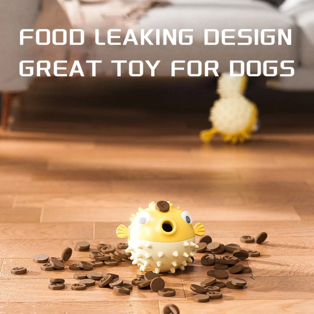 Yellow vinyl fish-shaped dog chew toy with textured surface for dental care