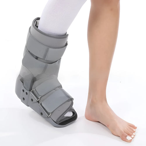 Grey Achilles tendon rehabilitation boot with aluminium struts and adjustable straps.
