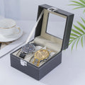 Grey high-grade leather watch storage box with see-through lid for dust protection.