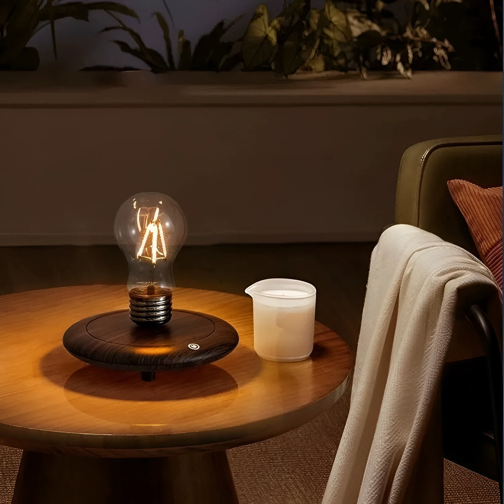 Black suspension bulb night lamp with wooden base on desktop