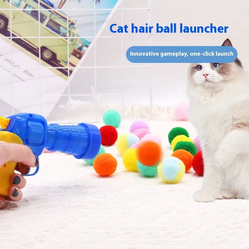 Plush ball launcher dog toy with soft pom-pom balls for indoor fetch games