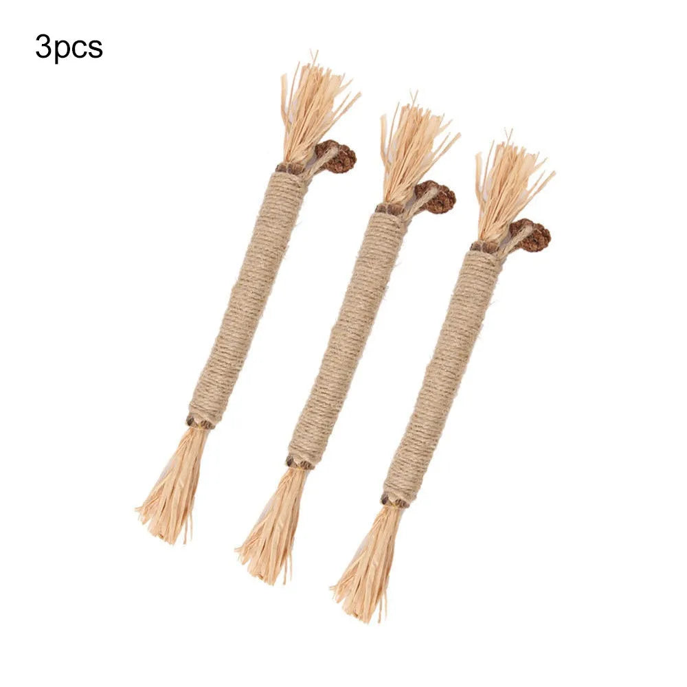 A 3 pack of natural silvervine chew sticks for cats on a wooden surface, showing thick and fine diameter options.