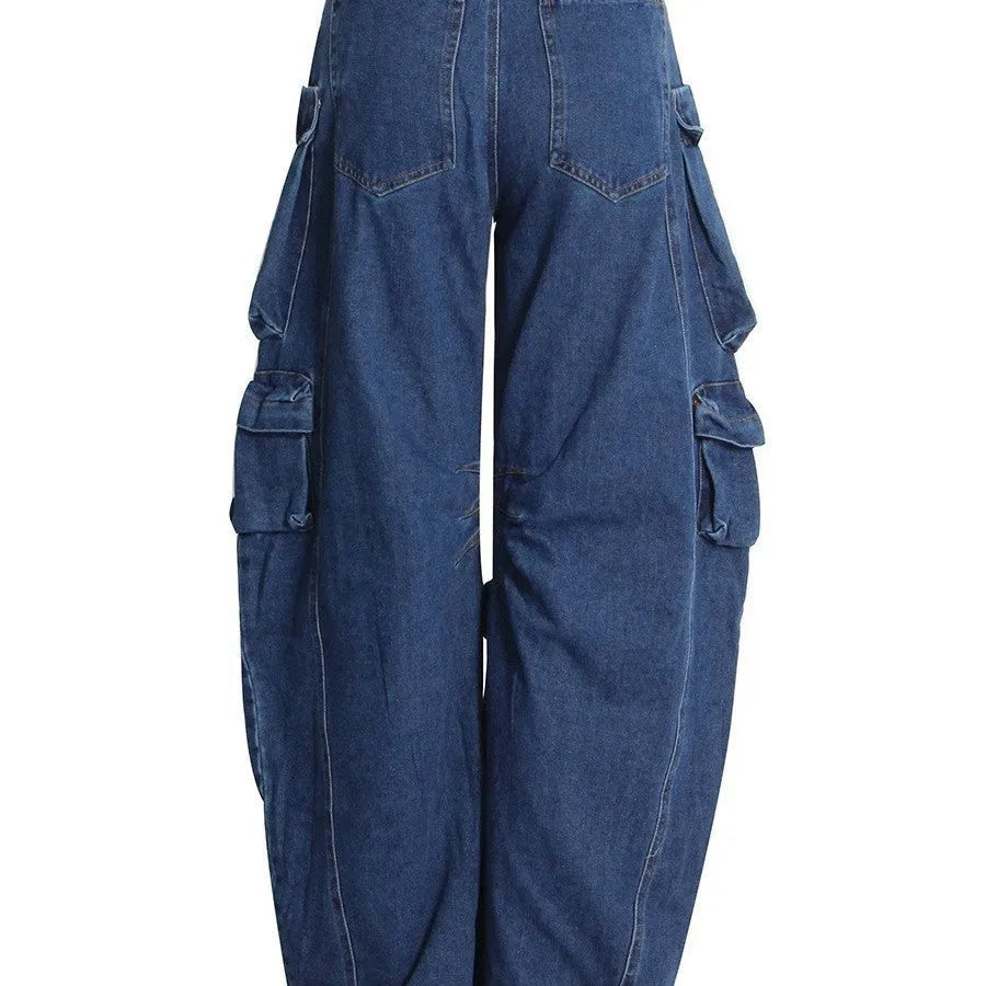 Dark blue distressed wide-leg jeans with high waist and multiple pockets on mannequin