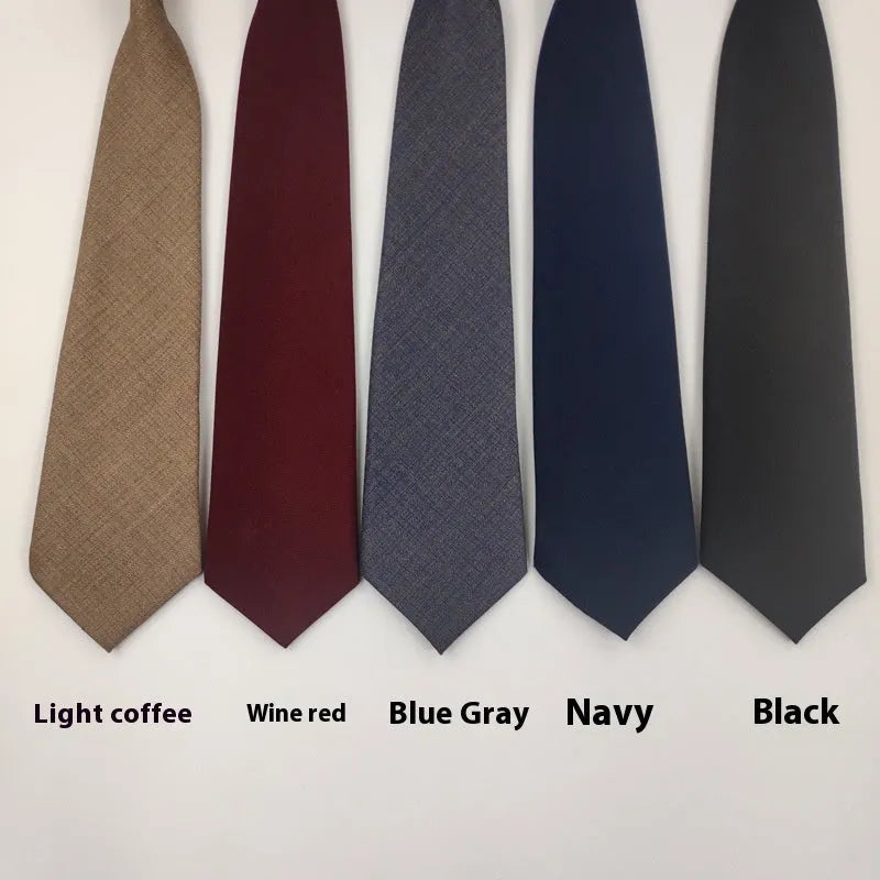 Men's solid colour cotton bow tie in arrow style showing navy blue option