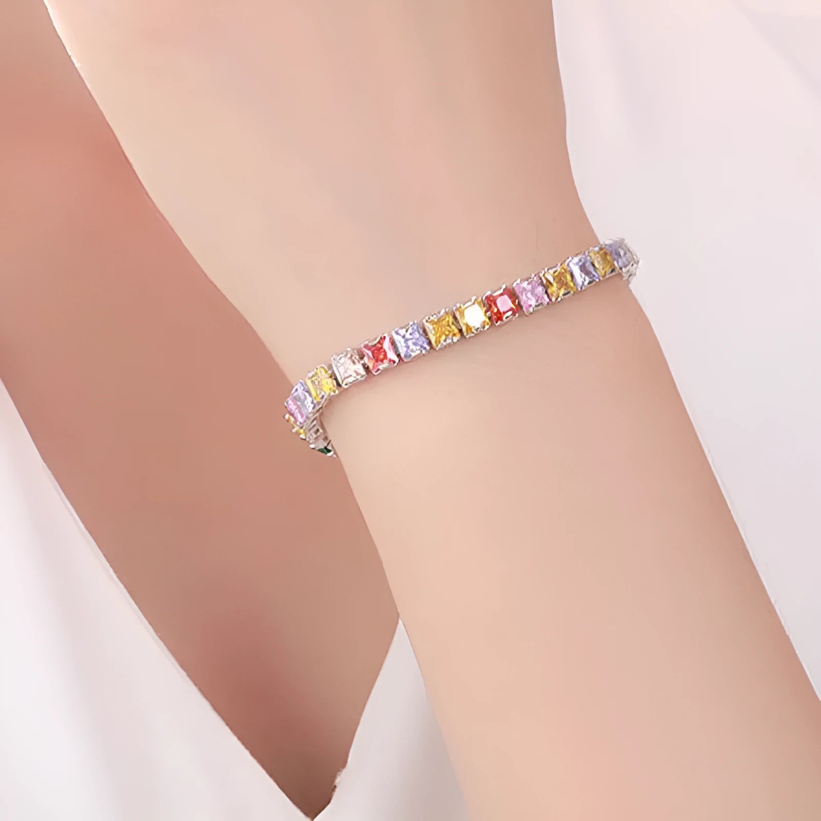 Electroplated real platinum women's square zircon bracelet with gang drill details in assorted colours.
