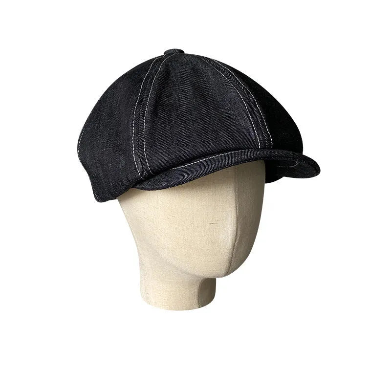 Black Japanese denim fabric beret hat shown in three adult sizes