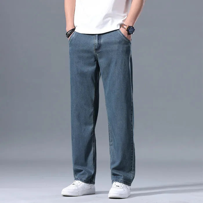 Men's straight leg loose fit lyocell jeans in blue and grey shades with zipper fly