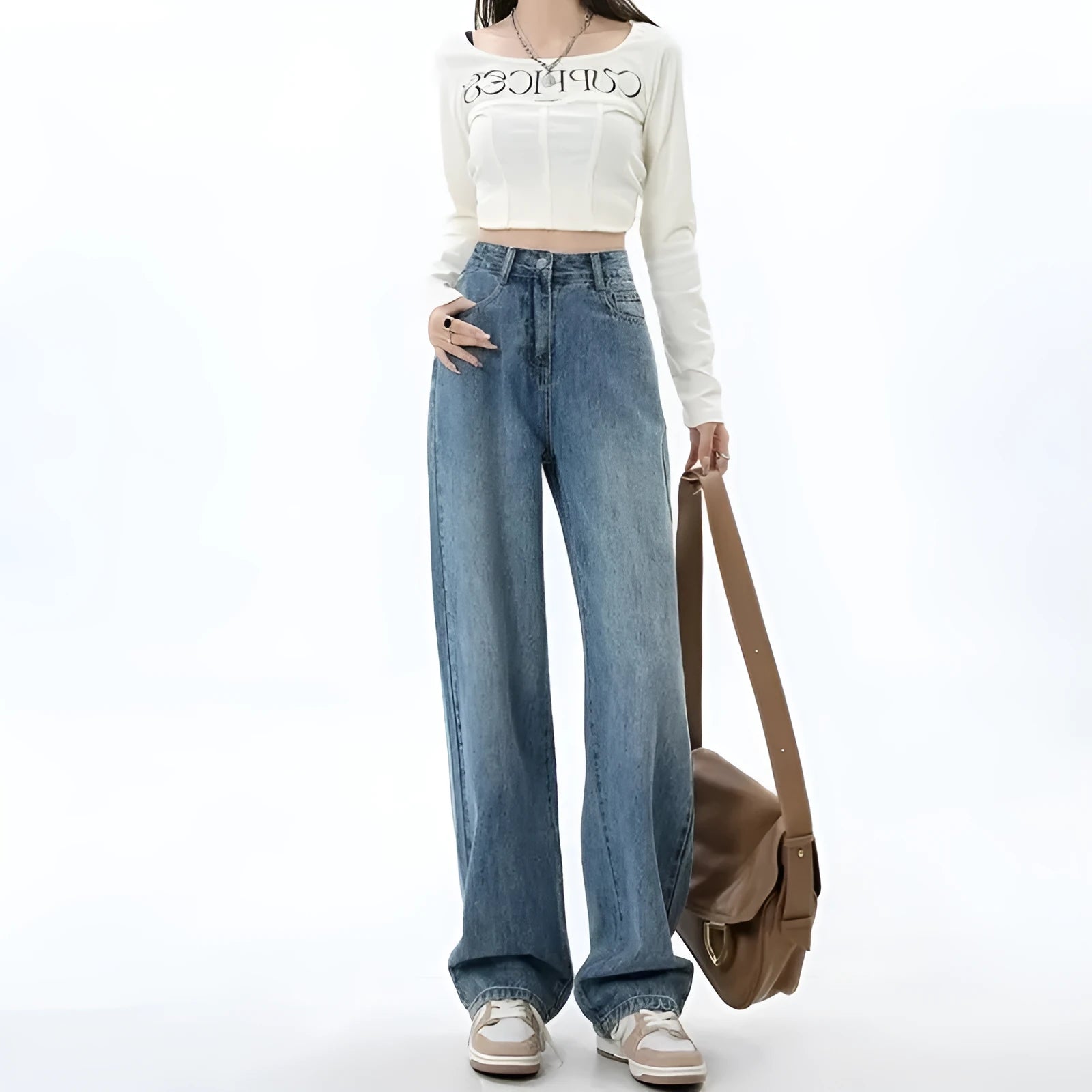 Women's retro blue wide leg jeans with high waist design and straight cut on model