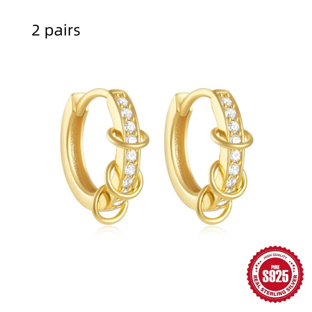Sterling silver geometric stud earrings with diamond detailing in gold or silver finish