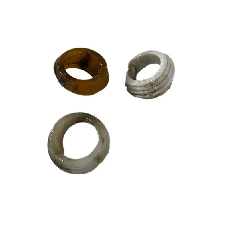 Chinese style irregular geometric wide resin ring in brown or white latte colour.