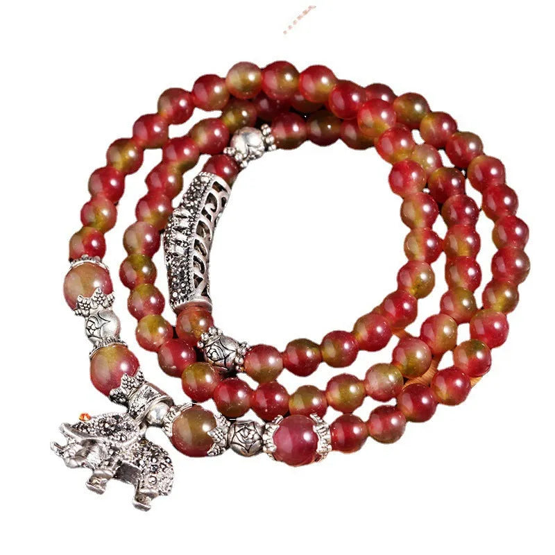 Watermelon crystal bracelet with Chinese knot fastening in 6mm or 8mm style options