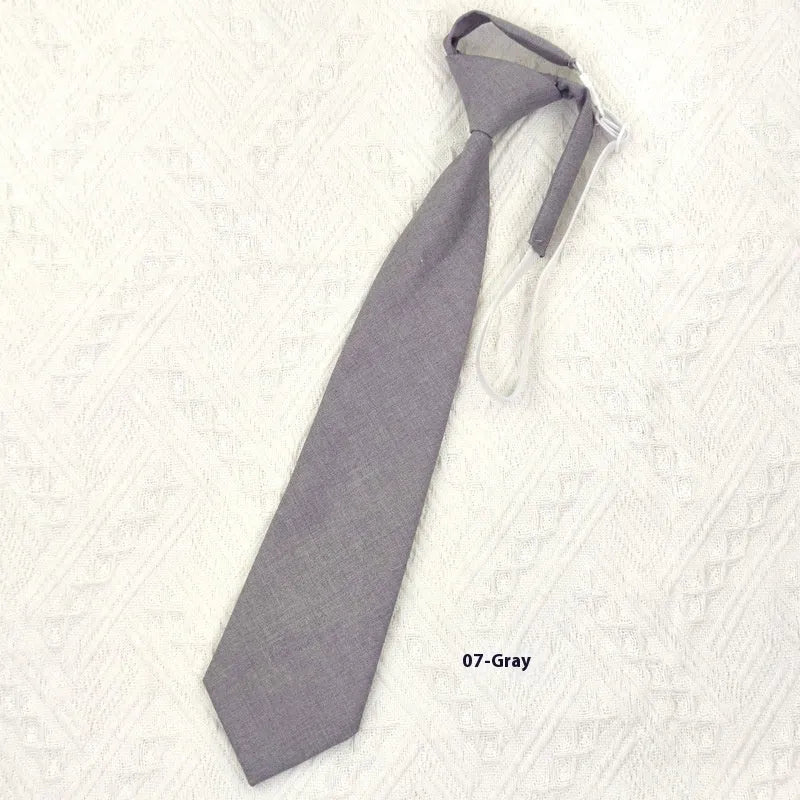 Men's solid colour cotton bow tie in arrow style showing navy blue option
