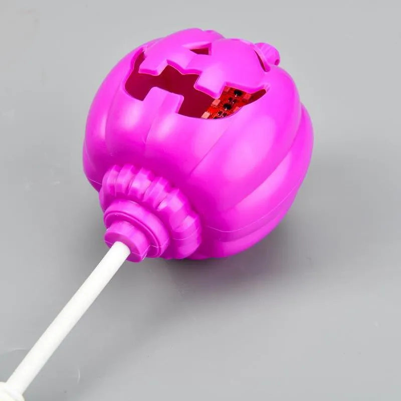 Purple and yellow light USB rechargeable plastic pumpkin lamp for Halloween decoration.
