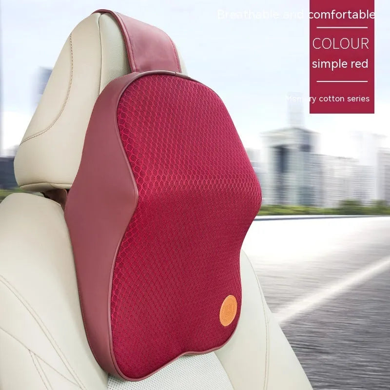 Black and brown memory foam car headrest pillow and lumbar support cushion set on a car seat.