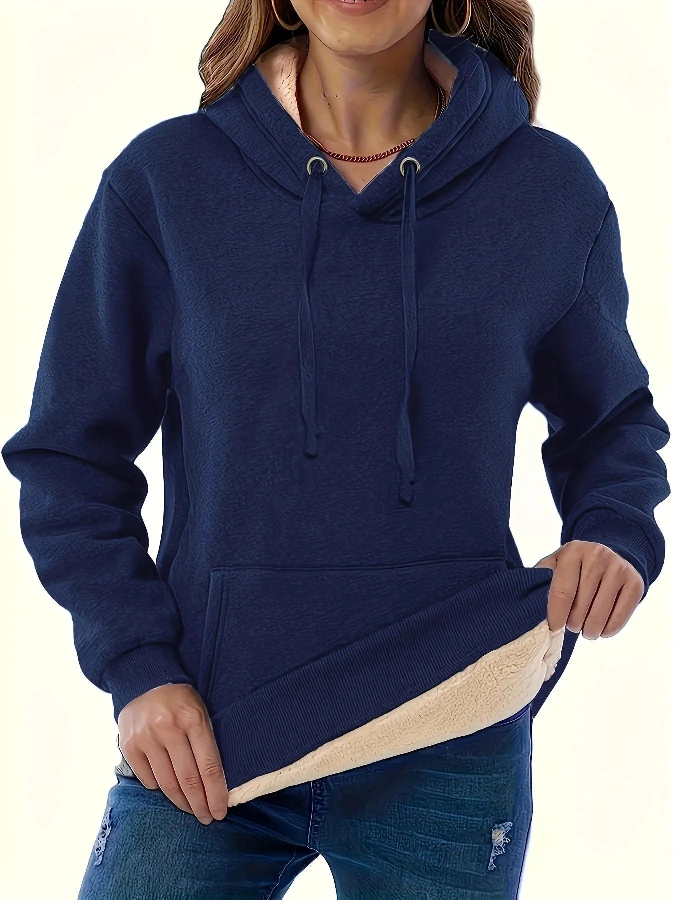 Women's loose grey hooded sweater with a 3D textured pattern on the front.