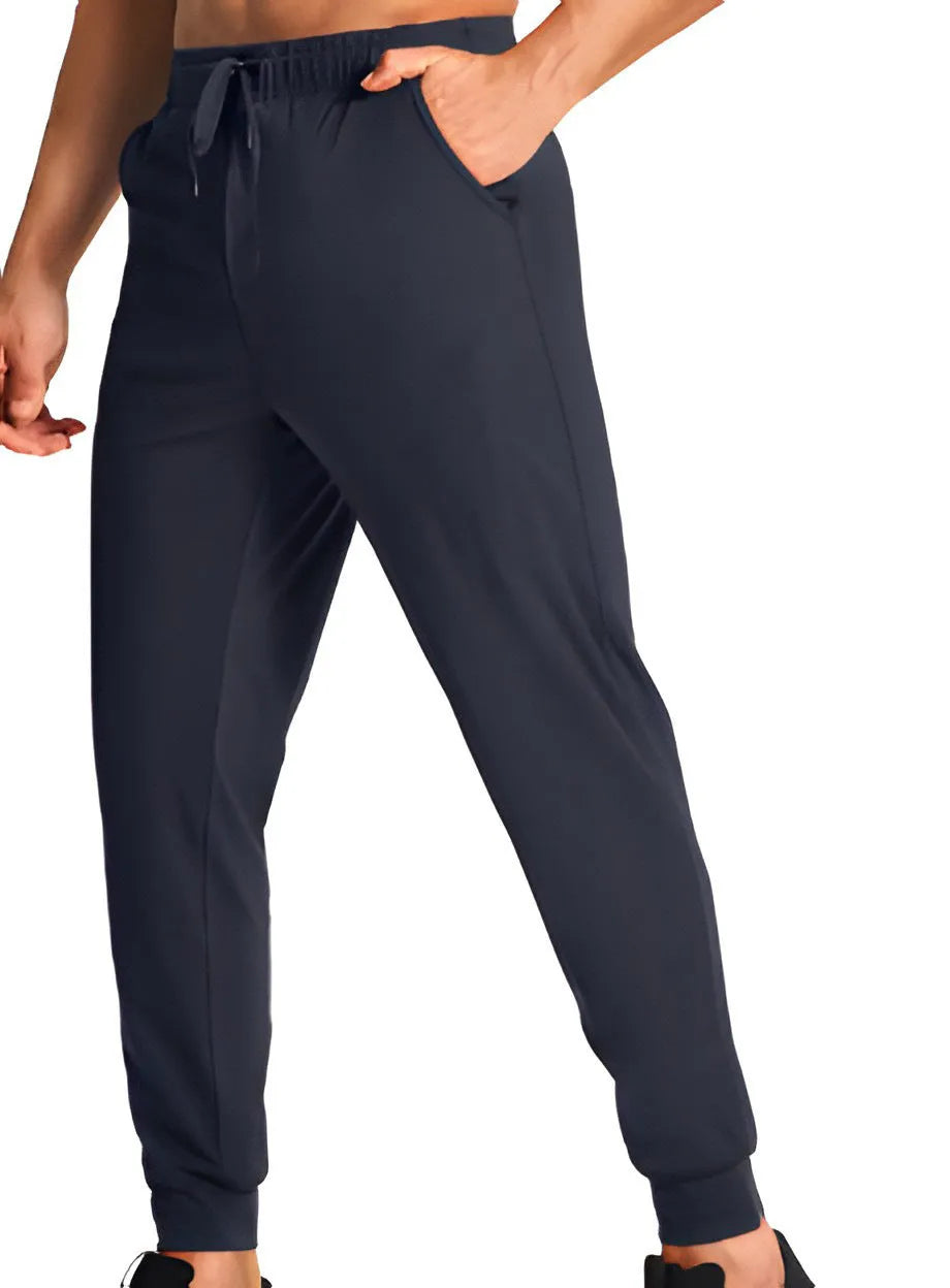 Men's loose fit casual trousers in solid colour with elastic waistband, available in multiple sizes