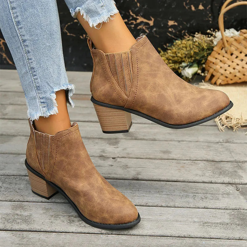 Women's black slip-on ankle boots with pointed toe and thick square heel for autumn winter wear