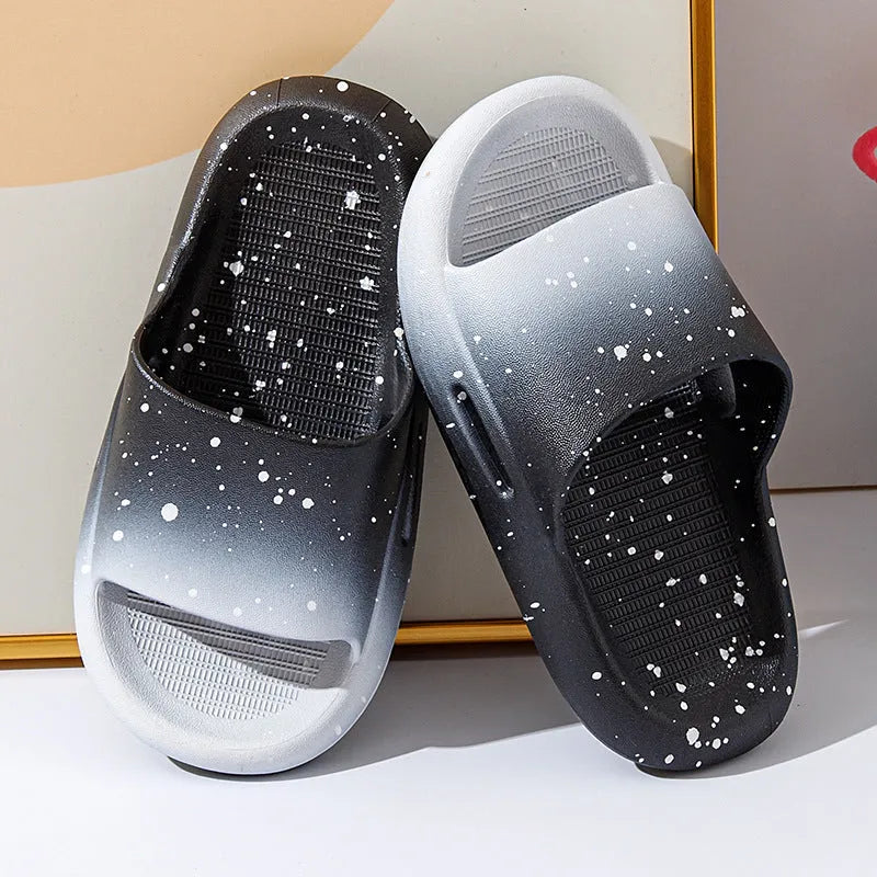 Gradient coloured PVC summer slippers for children on a non-slip sole.
