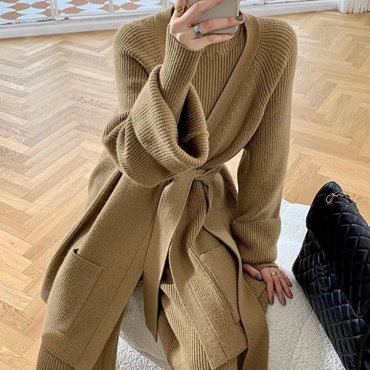 Women's knitted three-piece clothing set showing cardigan, wide-leg trousers, and top with leather stitching detail
