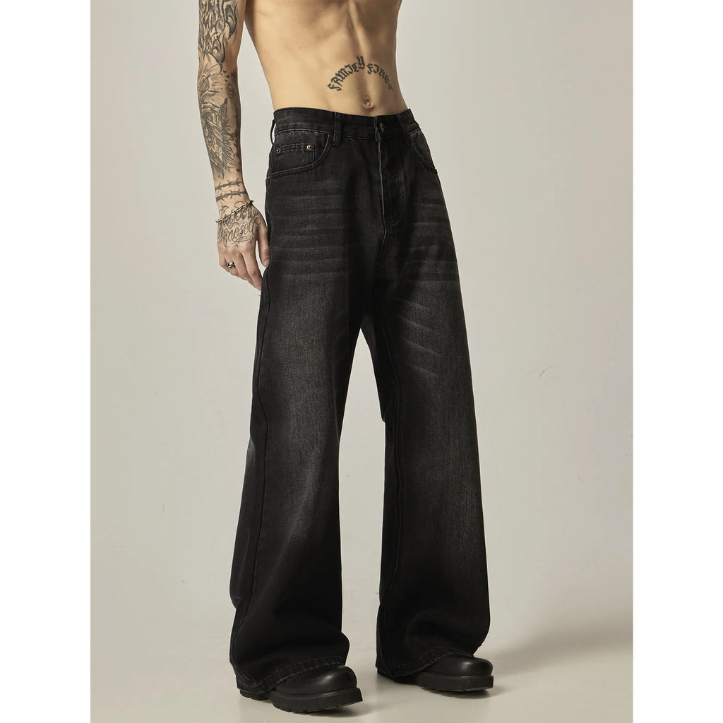 Black loose straight cut retro jeans with zipper fly on mannequin showing full silhouette