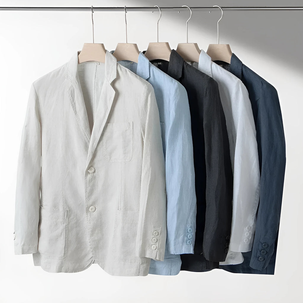 Men's loose fit linen suit jacket in a solid colour on a hanger, showing casual long sleeve design.
