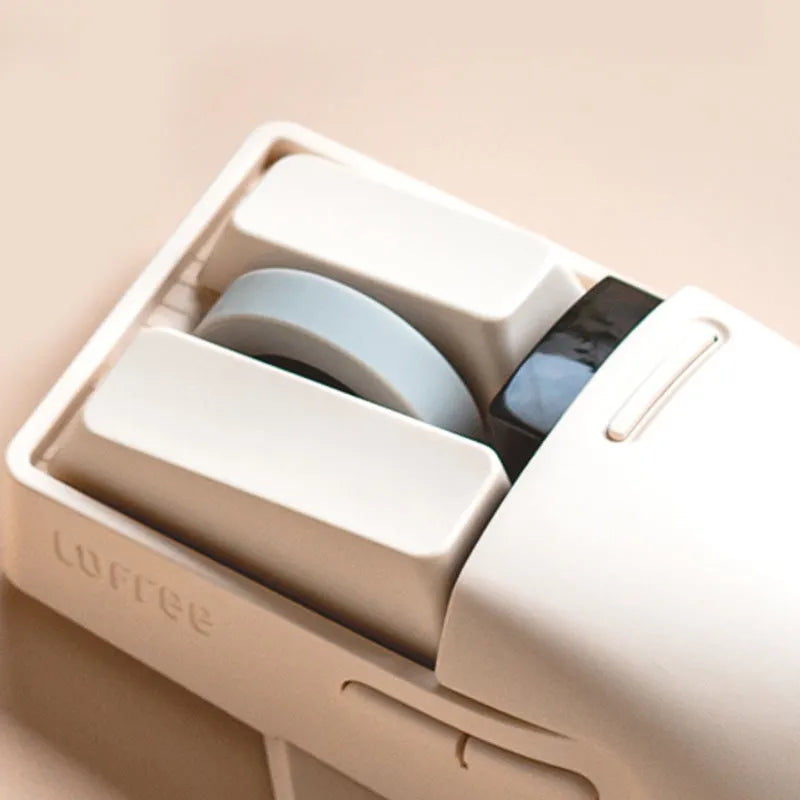 Tofu coloured wireless computer mouse with three connection modes and seven-button configuration.