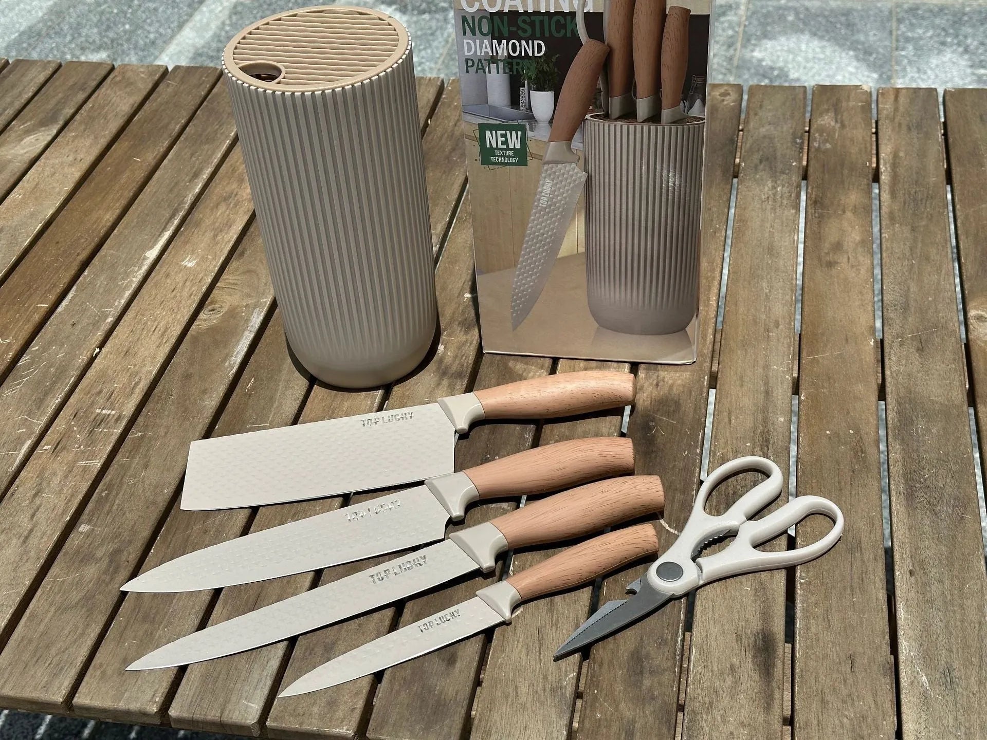 Five-piece kitchen knife set with khaki style wood grain handles and stainless steel non-stick blades