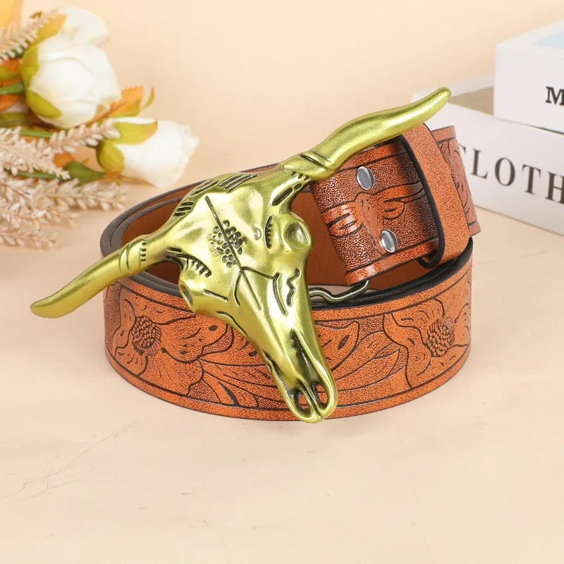 Men's black imitation leather belt with a detailed silver alloy cow head buckle and pin buckle fastening.