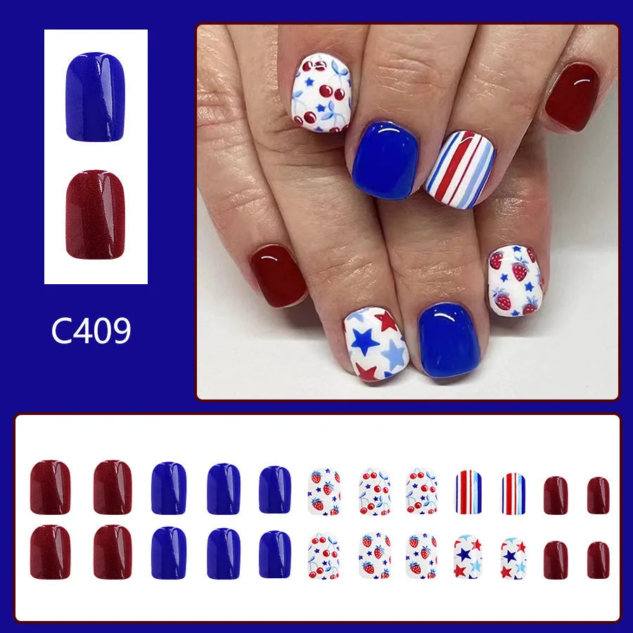 Short glossy red and blue nail stickers with strawberry and cherry pattern, 24 pieces.