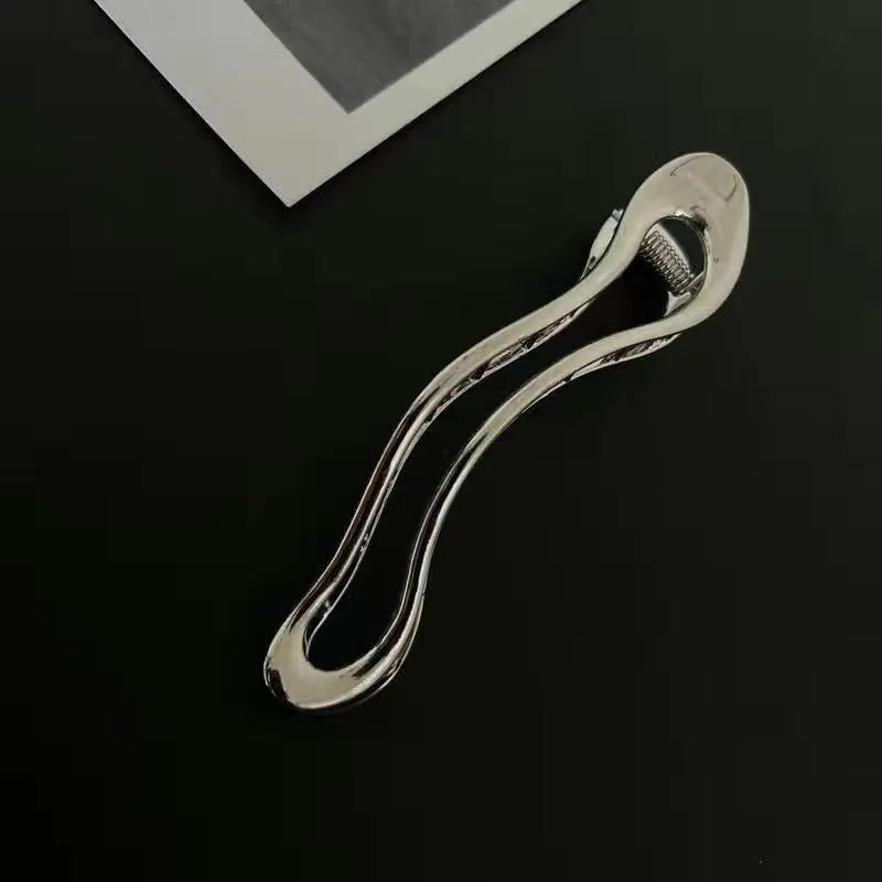 Women's zinc alloy hair barrettes in gold and silver square, arc and triangle shapes