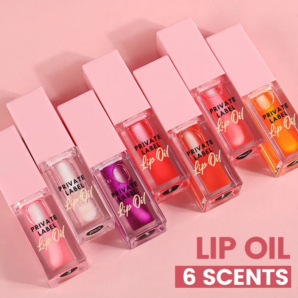Transparent lip gloss tube showing six fruit shade options including cherry and watermelon