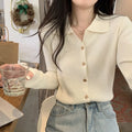 Beige viscose knitted cardigan with long sleeves displayed as bottoming top