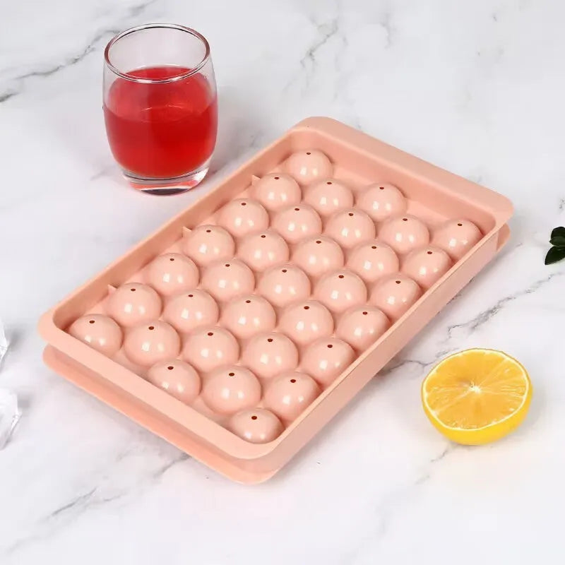 Blue silicone ice cube tray with lid showing 33 round grids, measuring 24x14x3cm