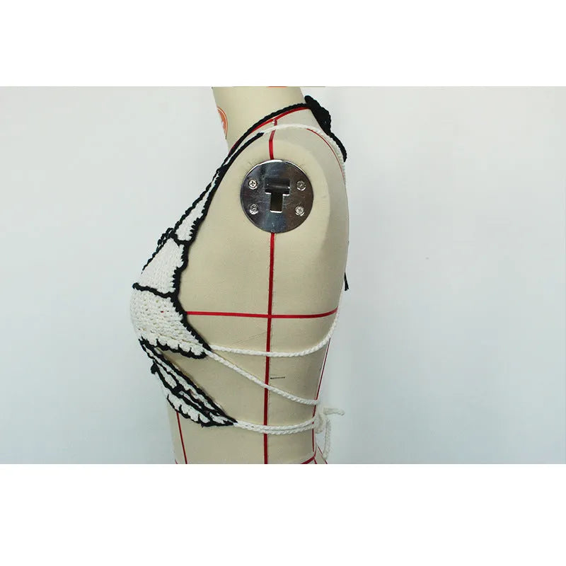 Women's black and white classic bikini swimsuit on a mannequin