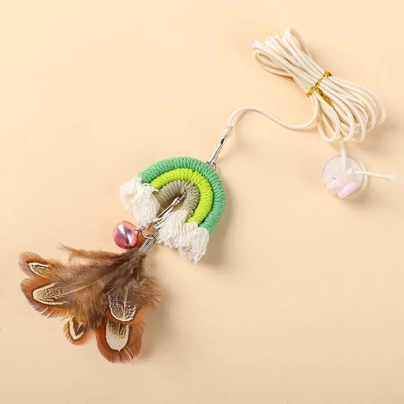 Blue feather rope cat toy hanging from door with elastic swing and sticky buckle clamp