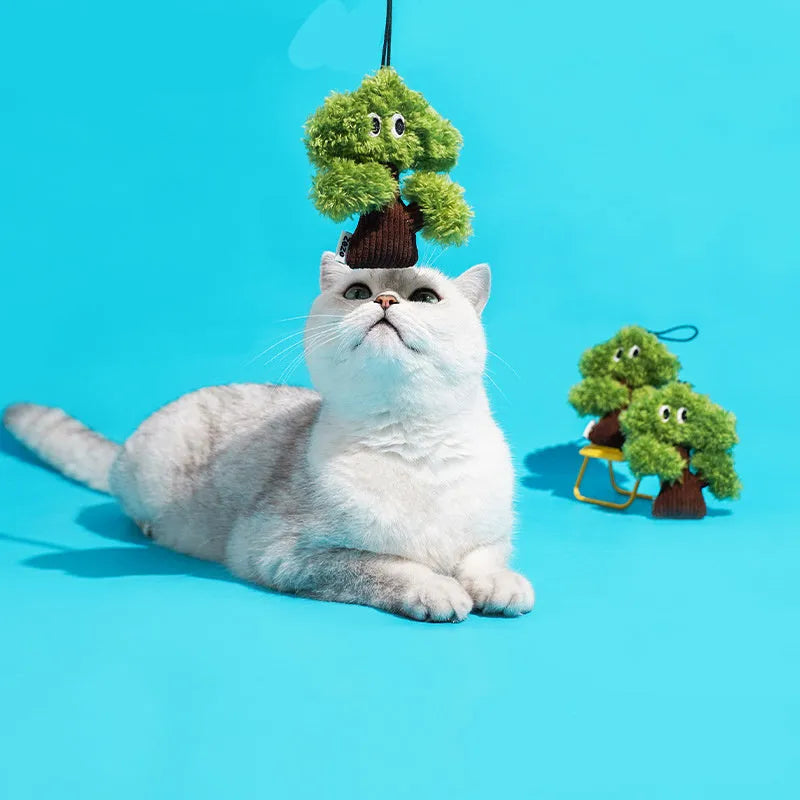Pine tree shaped cat toy stick with catnip bag pendant, shown in large, medium, and small sizes.