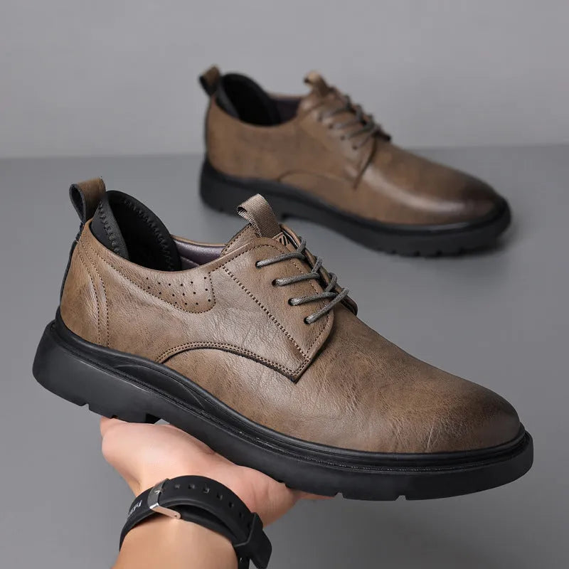Men's black and brown leather sneakers with cowhide uppers and rubber soles