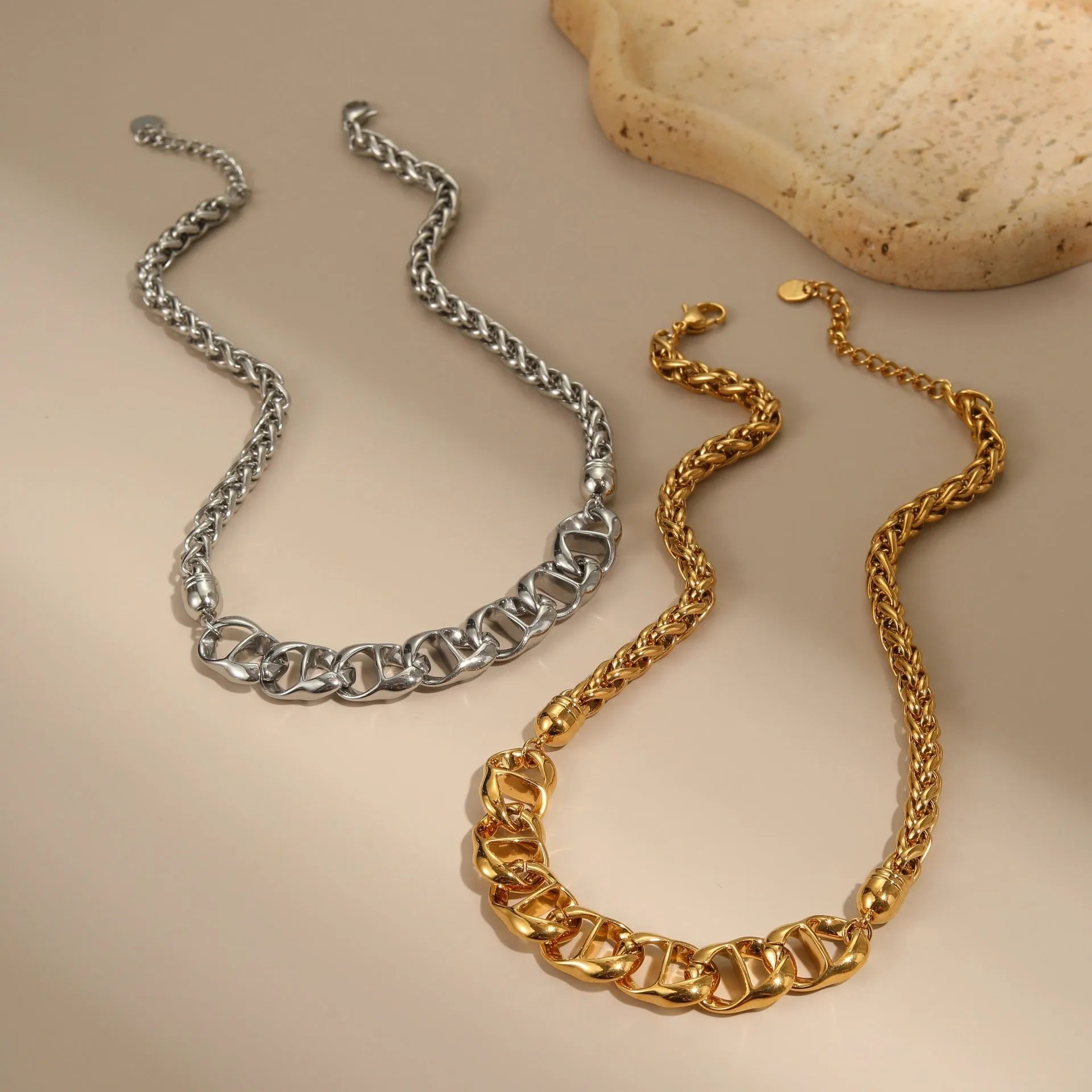 Stainless steel necklace with gold electroplated finish and geometric pendant design