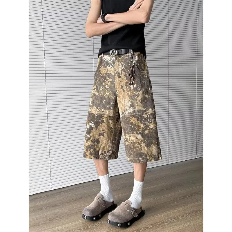 Yellow snake camouflage cropped jeans on a denim background