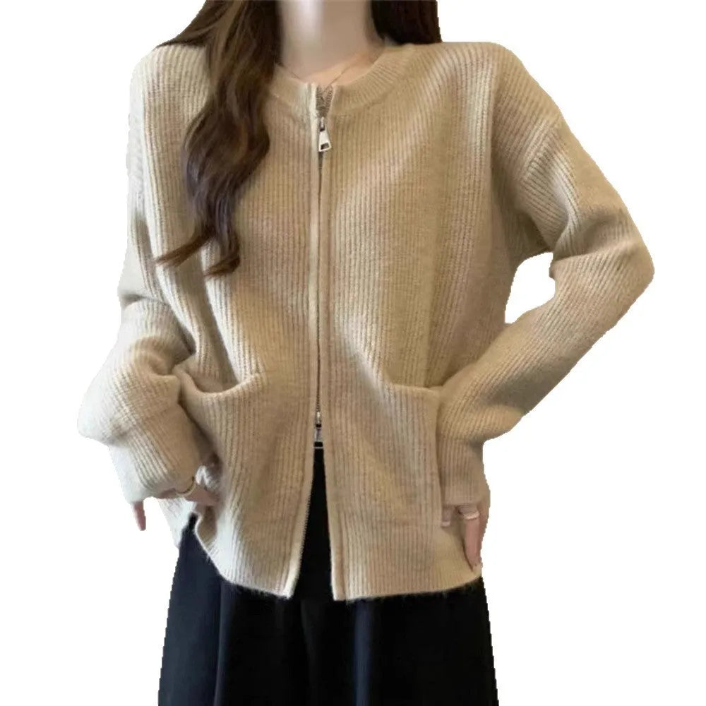 Beige viscose fibre soft wind cardigan coat with long sleeves on a hanger.