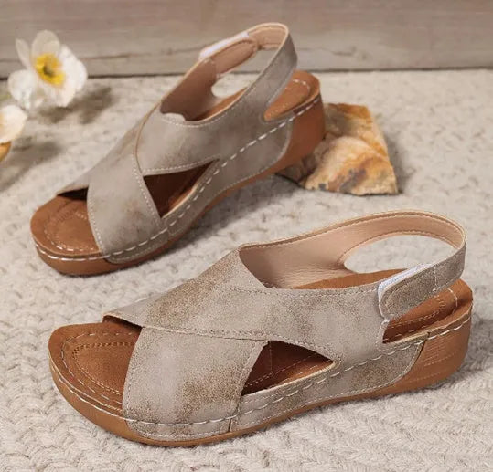Roman platform sandals with skirt detail and adjustable Velcro strap in earthy colour options