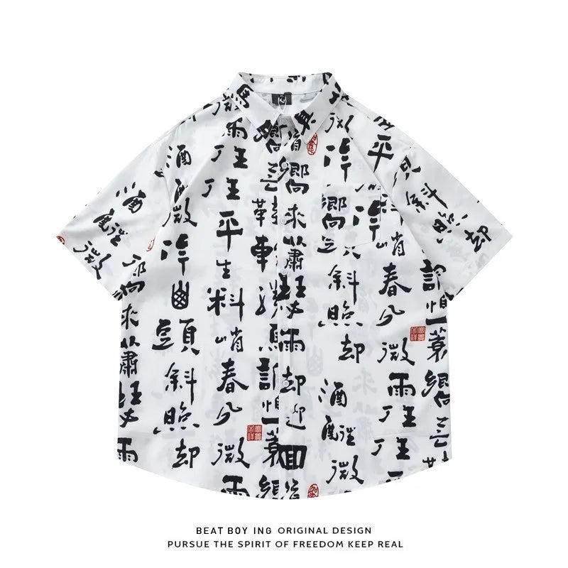 Loose fit short sleeve shirt with all-over floral print, cardigan style, in a polyester fabric.
