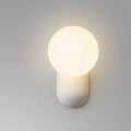 Nordic bedside wall lamp in black with acrylic shade and resin body
