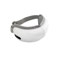 White portable electric eye massager with hot compress and airbag massage functions on a plain background