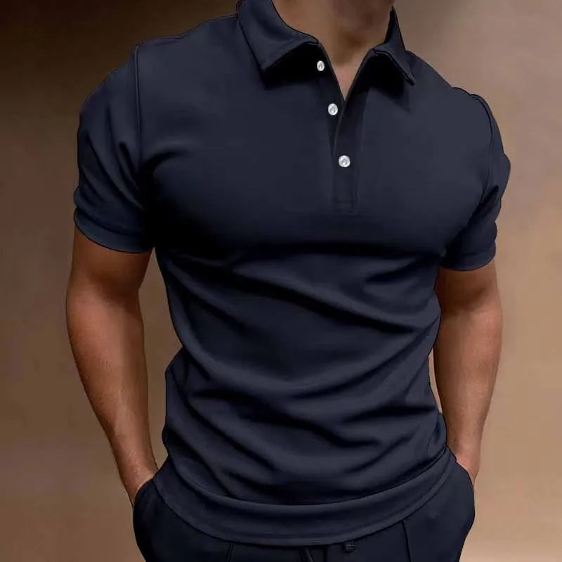 Man wearing a grey loose fit cotton blend short sleeve t-shirt for casual leisure wear.